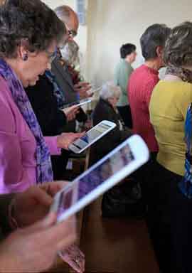 Senior with Touch Screen Tablet PC
